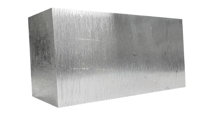 Aluminium blank, a sawn block of solid stock before machining.